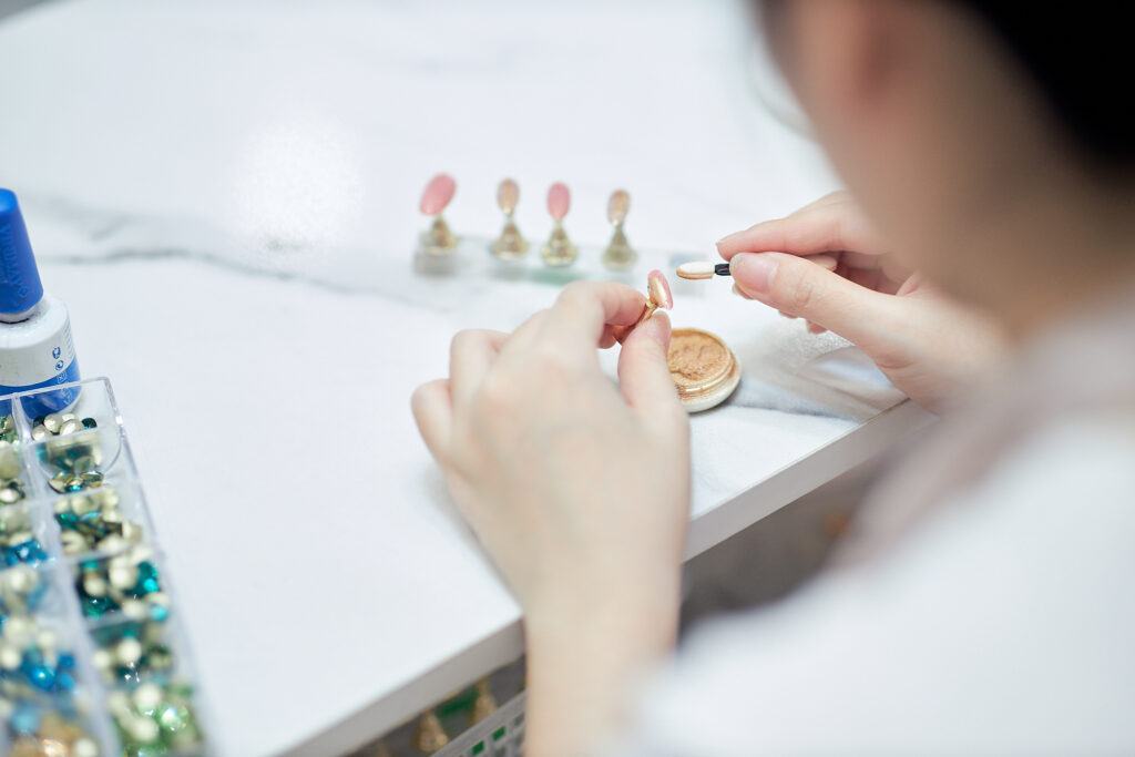 A person painting nails